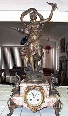 Moreau Statue Clock